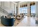 Elegant lobby with high ceilings, designer furniture, and floor-to-ceiling windows at 2950 Mount Wilkinson Se Pkwy # 505, Atlanta, GA 30339