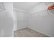 Spacious walk-in closet equipped with ample shelving and storage solutions, ideal for organizing your wardrobe at 2950 Mount Wilkinson Se Pkwy # 505, Atlanta, GA 30339