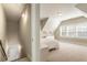 Upstairs bedroom features a carpet, closet, dormer window, neutral paint, and bright natural light at 105 Ivey Way, Woodstock, GA 30188