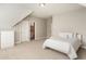 Cozy bedroom with neutral tones, featuring an ensuite bathroom and comfortable decor at 105 Ivey Way, Woodstock, GA 30188