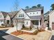 Lovely home featuring a blend of brick and siding, a well-kept lawn, and a convenient two-car garage at 105 Ivey Way, Woodstock, GA 30188