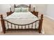 Comfortable wrought iron bed in bright main bedroom at 105 Ivey Way, Woodstock, GA 30188