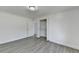 Bedroom with a closet and grey wood-look flooring at 2762 Inverloch Cir, Duluth, GA 30096