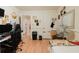 Functional bedroom space with laminate floors, standard furnishings, and bright natural light at 5461 Chuzzlewit Sw Ct, Lilburn, GA 30047