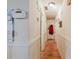 Hallway with hardwood style flooring leads to rooms at 5461 Chuzzlewit Sw Ct, Lilburn, GA 30047