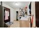 Small laundry room area with washer and dryer as well as storage shelving in the back at 5461 Chuzzlewit Sw Ct, Lilburn, GA 30047