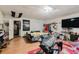 Spacious living room area features hardwood style floors and recessed lighting at 5461 Chuzzlewit Sw Ct, Lilburn, GA 30047
