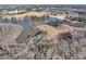 An aerial view of the community featuring lake and a network of roads at 3000 Shade Tree Ct, Villa Rica, GA 30180