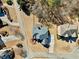 An aerial view of the neighborhood featuring the home's roof, landscaping, and surrounding trees at 3000 Shade Tree Ct, Villa Rica, GA 30180
