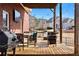 View of the beautiful wooden back deck featuring outdoor seating and string lights for a cozy atmosphere at 3000 Shade Tree Ct, Villa Rica, GA 30180