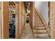 Unfinished basement with exposed framing, staircase and visible ductwork at 3000 Shade Tree Ct, Villa Rica, GA 30180