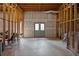 Unfinished basement space featuring exposed ceiling and framing with a concrete floor at 3000 Shade Tree Ct, Villa Rica, GA 30180