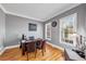 Cozy home office with hardwood floors, a workspace desk, natural light, and elegant wall decor at 3000 Shade Tree Ct, Douglasville, GA 30180