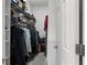 This walk-in closet has shelving and hanging space for organizing clothes, shoes, and accessories at 3000 Shade Tree Ct, Villa Rica, GA 30180
