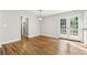 Charming dining area with hardwood floors and french doors leading to a deck at 2740 Dale Creek Nw Dr, Atlanta, GA 30318