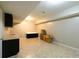 Basement kitchenette with sink, counter space and plenty of storage at 8245 Mill Run Trl, Whitesburg, GA 30185