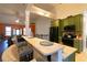 Kitchen with breakfast bar offering seating, and a view to the living room at 8245 Mill Run Trl, Whitesburg, GA 30185