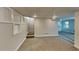 Finished basement area with recessed lighting, carpet, and stairs to main level at 225 Powder Creek Dr, Dallas, GA 30157
