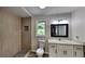 Modern bathroom with a tiled shower, and vanity with quartz countertop at 225 Powder Creek Dr, Dallas, GA 30157