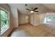 Spacious bedroom with carpet, ceiling fan, and natural light at 225 Powder Creek Dr, Dallas, GA 30157
