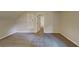 Carpeted bedroom with neutral walls, closet, and doorway leading to another room at 225 Powder Creek Dr, Dallas, GA 30157