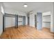 Modern bedroom featuring hardwood floors, ample closet space, and neutral paint at 2680 Brown Nw St, Atlanta, GA 30318