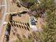 Aerial view of home showcasing long driveway and treelined yard at 212 Lakeview Dr, Newborn, GA 30056