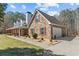 Charming stone home with a covered porch and beautiful landscaping at 212 Lakeview Dr, Newborn, GA 30056