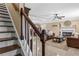 Cozy living room with a fireplace, comfortable leather furniture, and stylish decor at 212 Lakeview Dr, Newborn, GA 30056