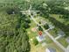 Aerial view of home with landscaping and proximity to nearby Piney Grove and Mohansic Avenue at 709 Mohansic Ave, Loganville, GA 30052