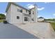 Spacious backyard featuring a concrete patio and green lawn offers an ideal space for outdoor activities at 709 Mohansic Ave, Loganville, GA 30052