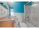 Bathroom featuring a granite countertop, ceramic tile, walk in shower, and modern fixtures at 709 Mohansic Ave, Loganville, GA 30052