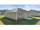 Backyard of house showing the property and the patio located just outside the home at 8592 Secretariat Dr, Lithonia, GA 30058