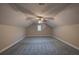 Bonus room with neutral paint, carpet, and ceiling fan with light fixture at 1261 William Robert Sw Dr, Marietta, GA 30008