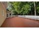Large deck with a white banister overlooking backyard at 1261 William Robert Sw Dr, Marietta, GA 30008