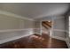 Bright living room with hardwood floors and neutral colored walls at 1261 William Robert Sw Dr, Marietta, GA 30008