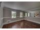Bright living room with hardwood floors and neutral colored walls at 1261 William Robert Sw Dr, Marietta, GA 30008
