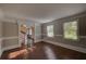 Bright living room with hardwood floors and neutral colored walls at 1261 William Robert Sw Dr, Marietta, GA 30008