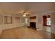 Spacious living room with beautiful tile floors, fireplace, and built-in shelving at 1261 William Robert Sw Dr, Marietta, GA 30008