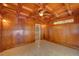 Cozy sunroom featuring wood paneled walls and ceiling and tile floors at 1261 William Robert Sw Dr, Marietta, GA 30008