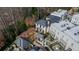 An aerial view of a home with a patio, a beautiful gazebo, and lush backyard landscaping at 229 Dovecrest Nw Dr, Atlanta, GA 30305