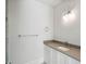 Bright bathroom featuring a light-colored vanity with light countertop and modern fixtures at 229 Dovecrest Nw Dr, Atlanta, GA 30305