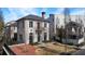Beautiful two-story home featuring a brick exterior, shutters, and a well-maintained lawn at 229 Dovecrest Nw Dr, Atlanta, GA 30305