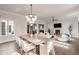 Bright and airy living space featuring modern furniture, an open floor plan, and hardwood floors at 229 Dovecrest Nw Dr, Atlanta, GA 30305