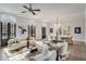 Bright living room with modern furniture, hardwood floors, and large windows at 229 Dovecrest Nw Dr, Atlanta, GA 30305