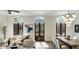 Open-concept living area featuring large windows, modern decor, and hardwood floors at 229 Dovecrest Nw Dr, Atlanta, GA 30305