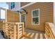 Cozy back porch with wooden deck and privacy screen, ideal for outdoor relaxation at 1106A Wedgewood Nw Dr, Atlanta, GA 30318