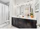 Modern bathroom featuring dual sinks, elegant vanity, and a well-lit mirror for a spa-like experience at 1311 English Nw St, Atlanta, GA 30318