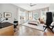 Inviting bedroom with ample natural light, neutral walls, and stylish decor, creating a relaxing space at 1311 English Nw St, Atlanta, GA 30318