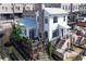 Stunning modern farmhouse featuring a metal roof, private deck and a brick and iron fence at 1311 English Nw St, Atlanta, GA 30318